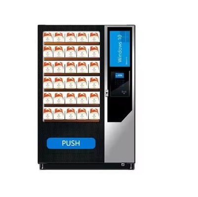 Une machine à vendre de jus de café numérique avec une option de pizza à l'encens est disponible.